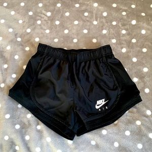 Black nike sports shorts.